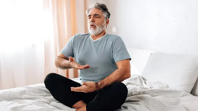 Musculoskeletal: man doing breathing exercise 1472399571
