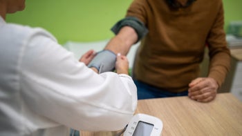 hypotension: closeup measuring blood pressure 1837504536