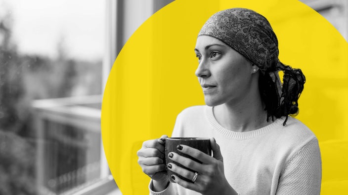 Black and white portrait of a woman with cancer wearing a headscarf. She is looking out the window while drinking a cup of coffee. There is also an added yellow graphic circled behind her head.