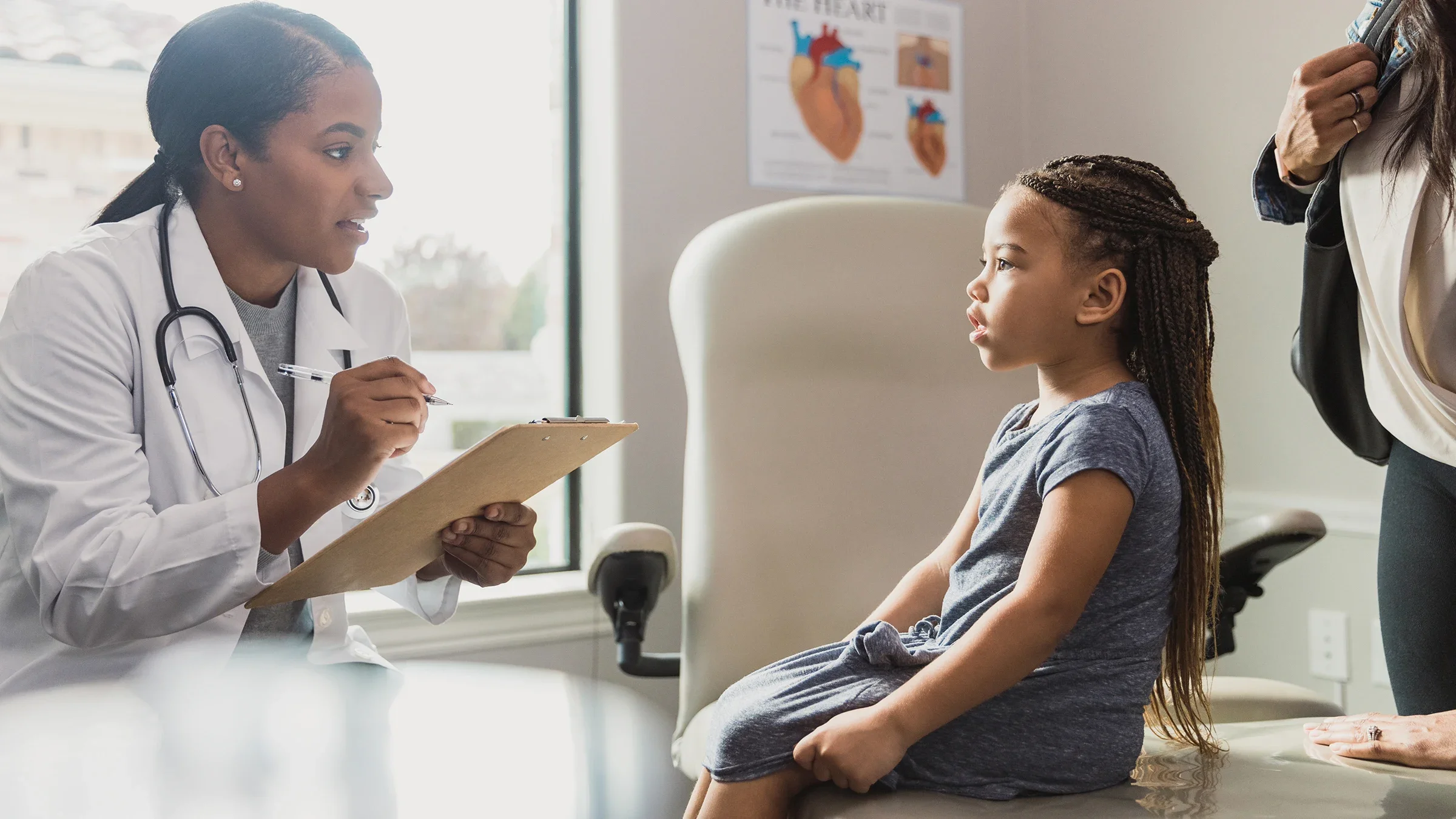 A mother and daughter at a medical appointment.
SDI Productions/E+ via Getty Images