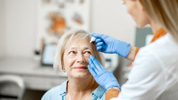 Health: Eye: senior woman eye drops 1178489719