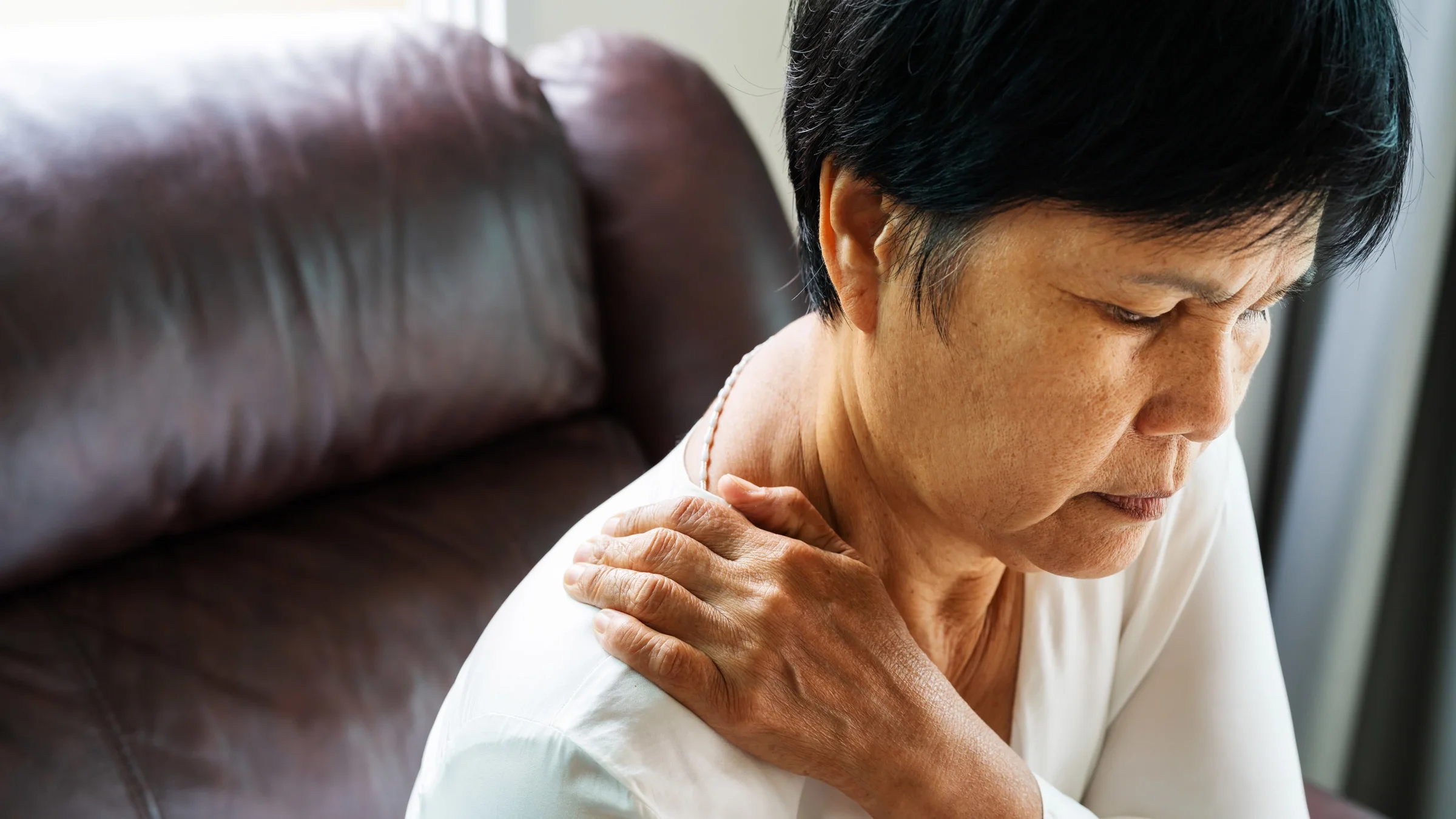 A person experiencing shoulder pain.