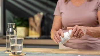 Protonix: opening pill bottle water 1475081461