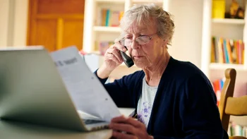 Medicare: senior woman on the phone 1206604977