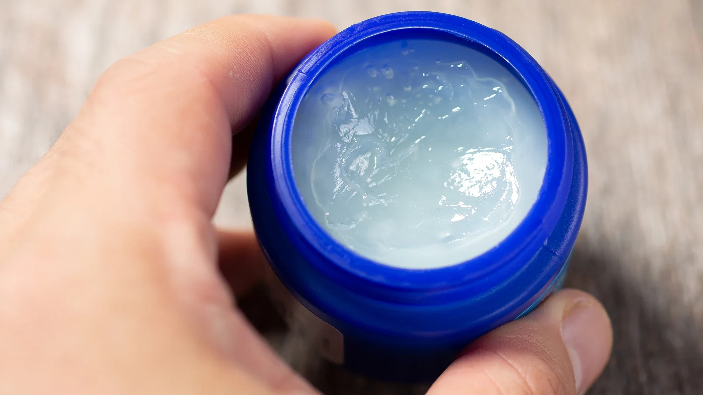 Close-up bottle of VapoRub in a blue bottle
Photography By Tonelson/iStock via Getty Images Plus