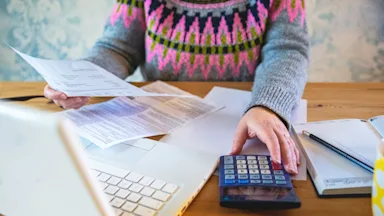 HDHP: cropped calculating bills-1214799630