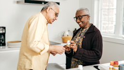 Elderly couple reviewing their prescriptions together in the kitchen.
kate_sept2004/E+ via Getty Images
