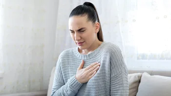 GERD: woman with heartburn 1216996999