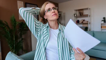 Menopause: woman having a hot flash 2231131350