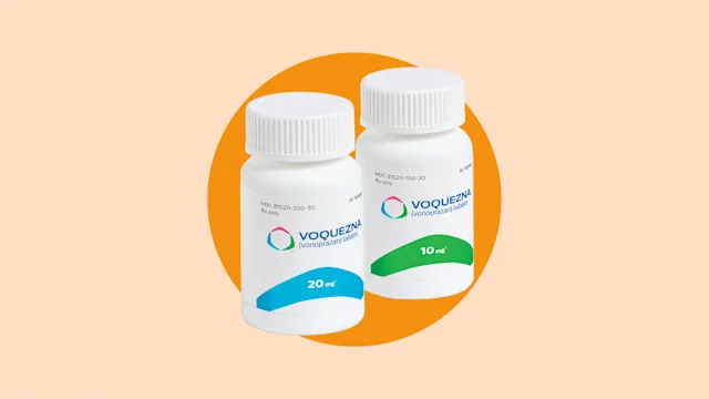 Voquezna: VOQUEZNA medication on orange background CourtesyofPhathomPharma 2400