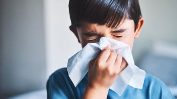 Children's health: Cough medicine side effects: child blowing nose 957764366