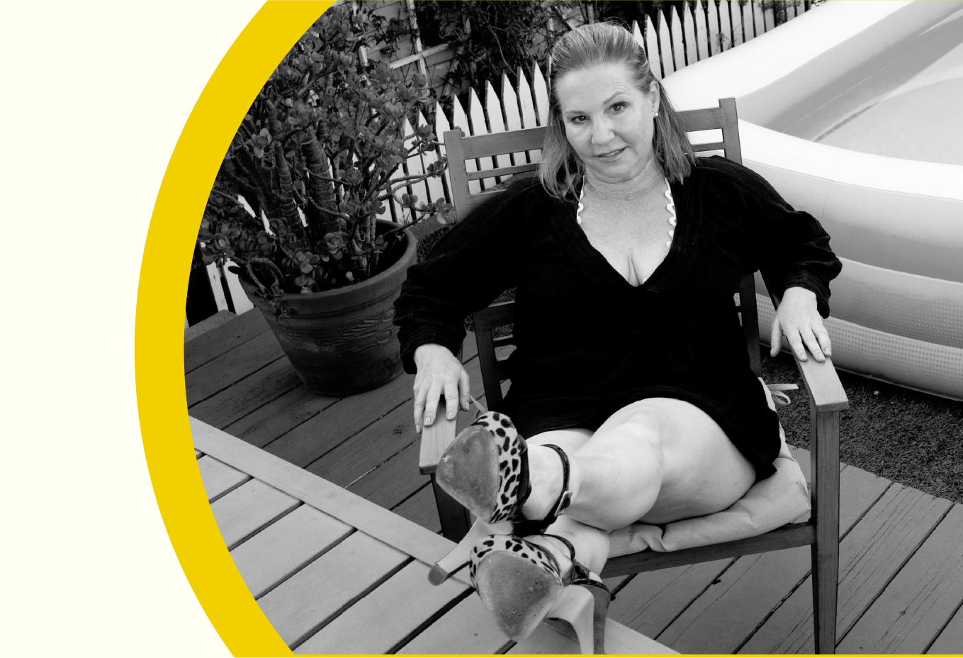 Portrait of Los Angeles comedian Lisa Sunstedt, outdoors by her kiddie pool.