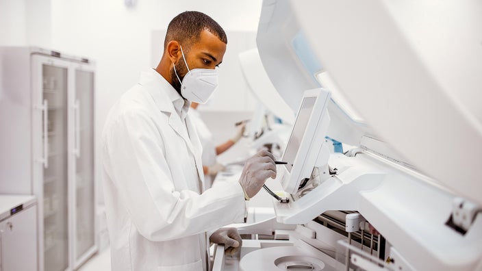 A scientist works in a laboratory.