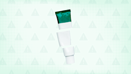 Light green background with texture and warning sign pattern. In the center is a white and green tube of cream cut into thirds.
GoodRx Health