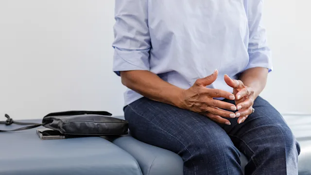 sickle cell disease: closeup woman on exam table 1483293077
