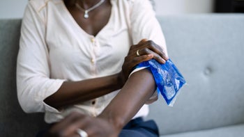 Health: Crestor: closeup woman ice pack arm 1325532613