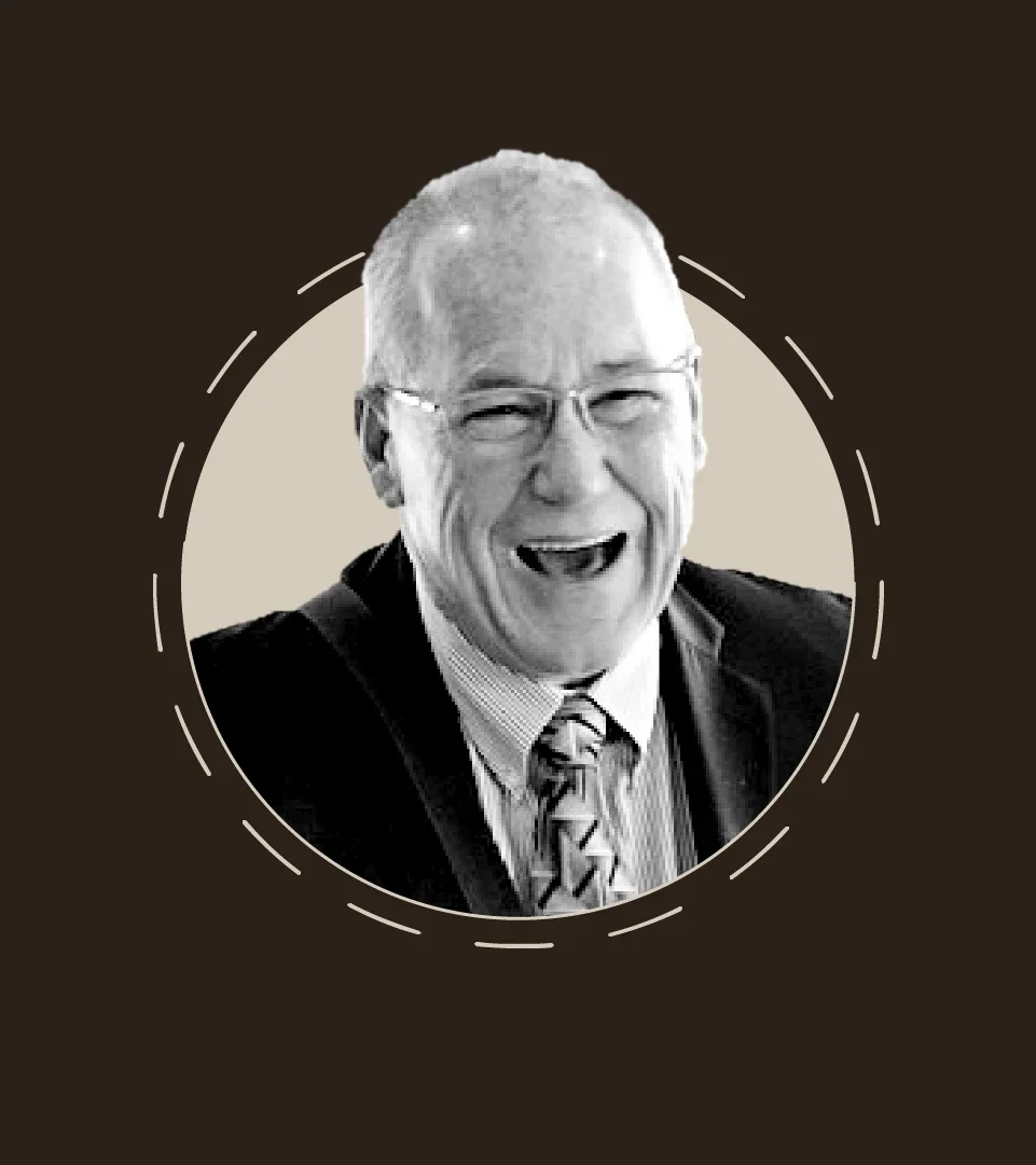 Rick Phillips is pictured in a headshot.