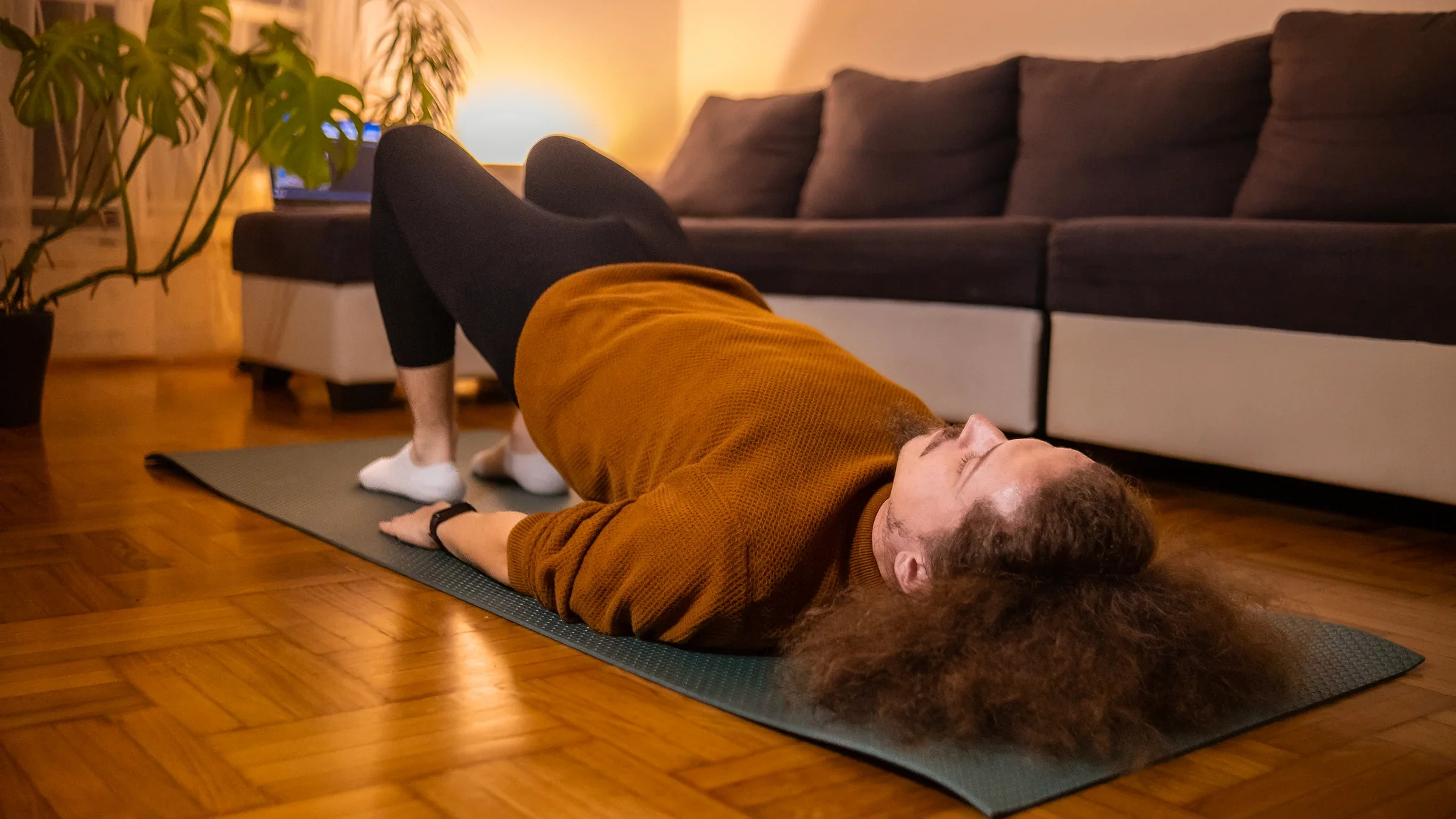 A man does a glute bridge exercise.
Valentina Stankovic/iStock via Getty Images Plus