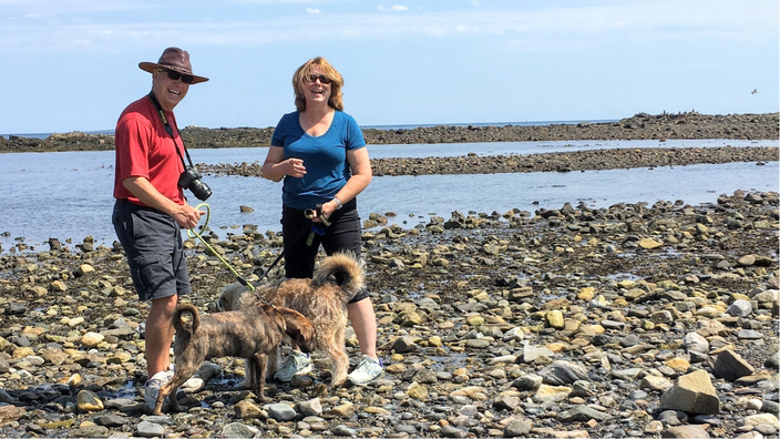 Julie and Jeff with their two dogs