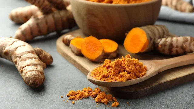 diet-nutrition: raw turmeric and powder 1905450605