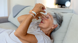 A woman uses eye drops at home.
Jelena Stanojkovic/iStock via Getty Images Plus