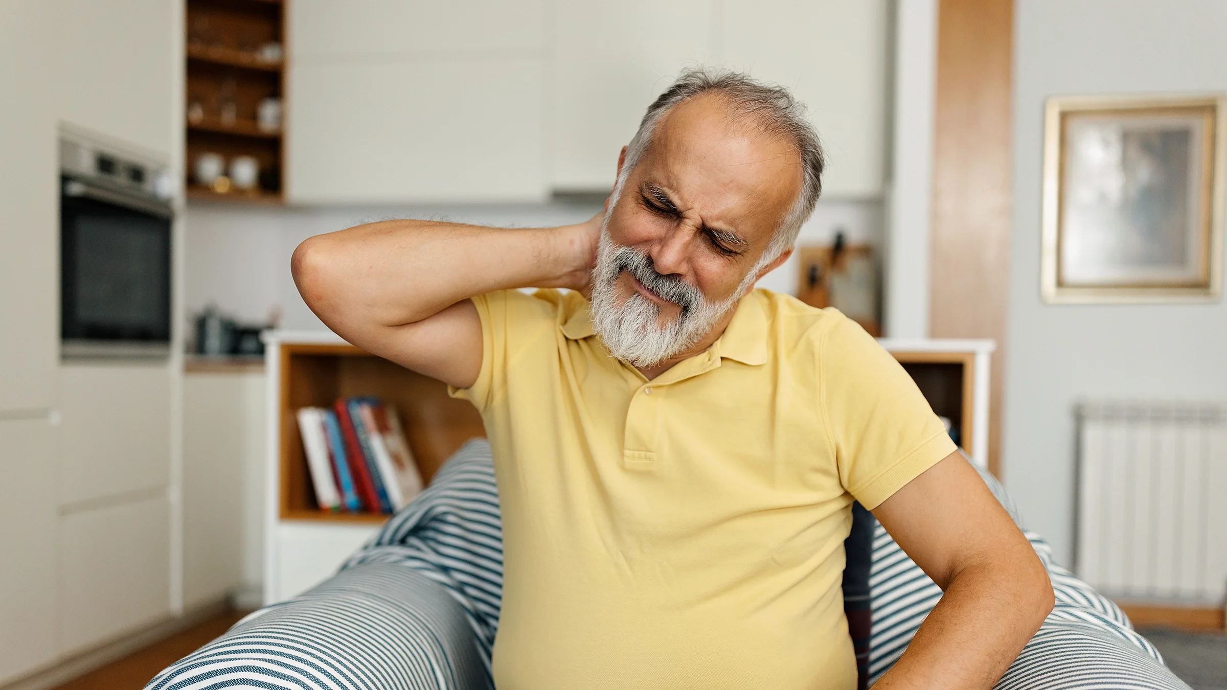 Older man with body aches.