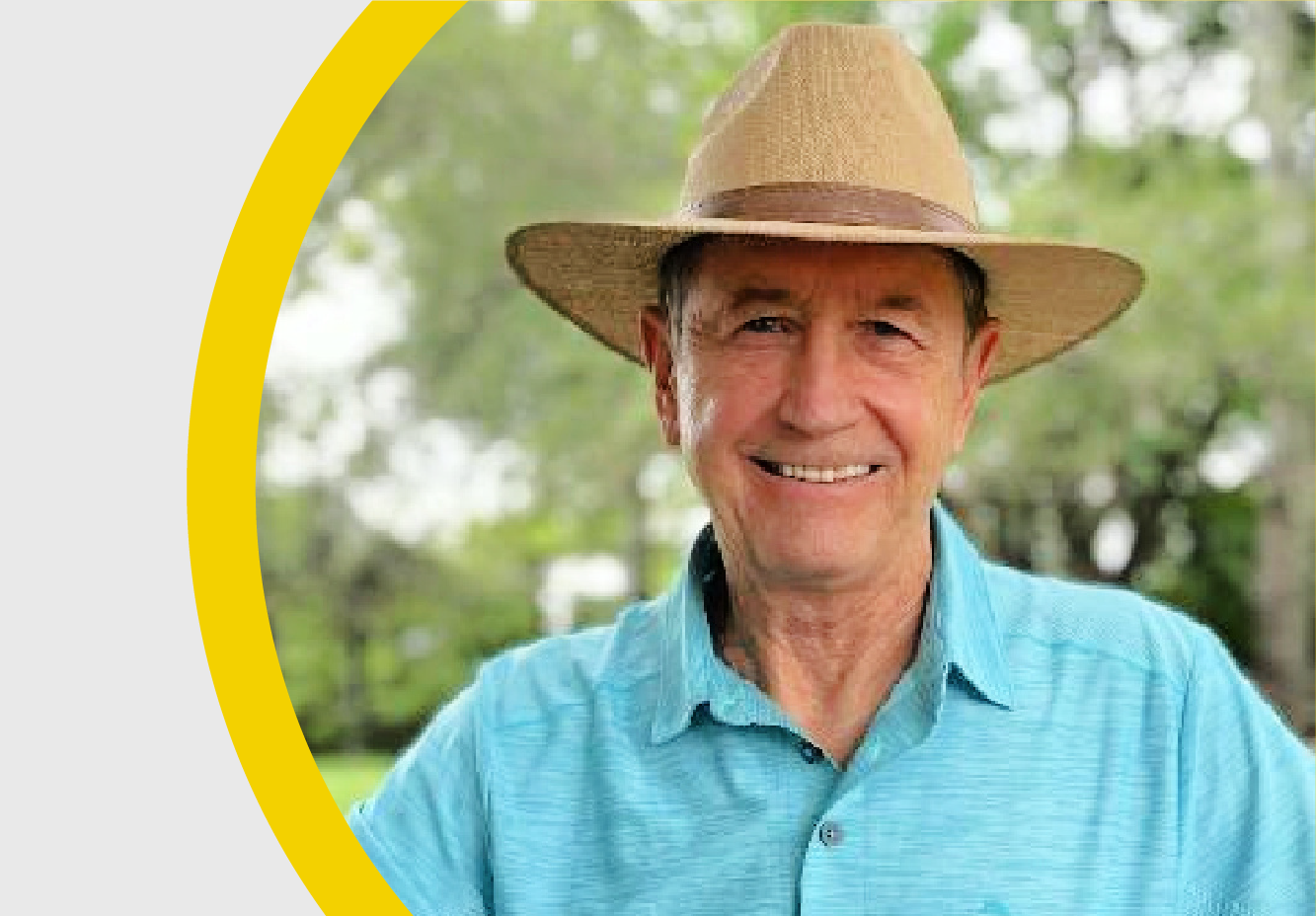 Portrait of Hawaii retiree and insomnia sufferer Owen Norton, wearing a sun hat, outdoors.