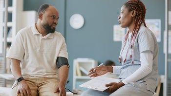 HCP: Patient: man at medical appointment 2174500156