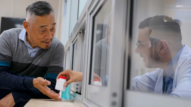Pharmacies: picking up prescription pharmacy window 1468742244