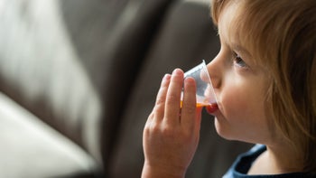 Children's tylenol: Safe dose: child taking cough medicine 1218758024