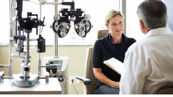 Health: Eye: woman at eye exam with doctor-89987853