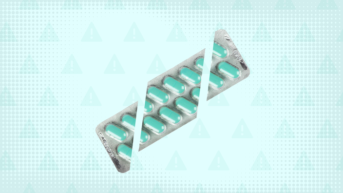 A custom graphic includes a teal background with a warning sign pattern and a blister pack of oblong, teal pills cut into thirds.