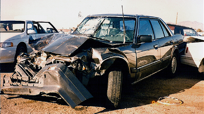 A snapshot of Rick Mathes’ wrecked car in 1992, an accident that fractured his spine.