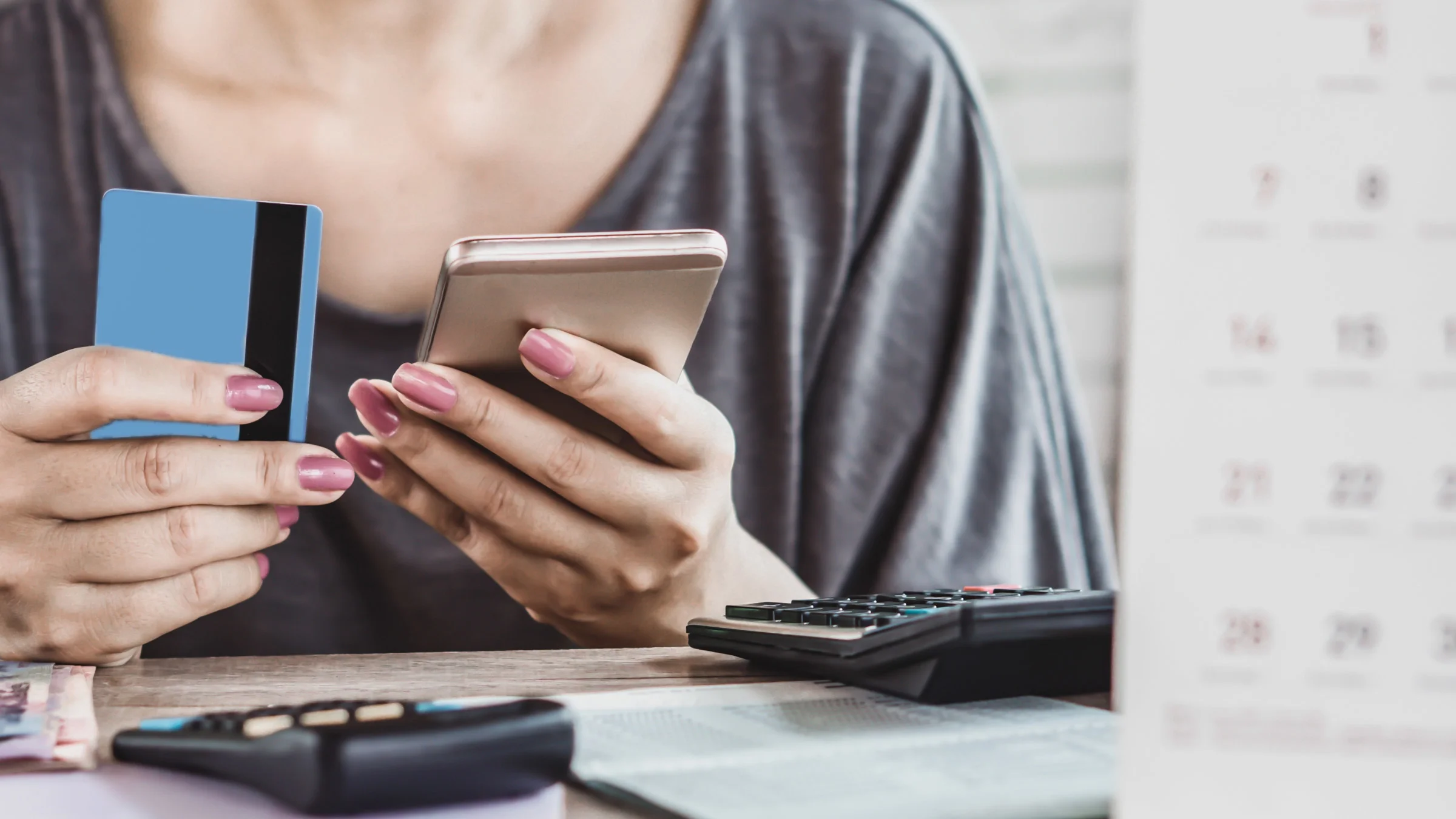 A person making an online payment on their phone.
