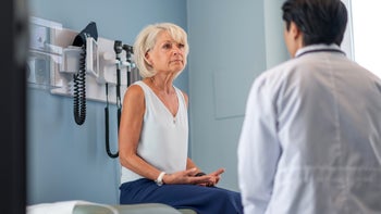 Overactive bladder: senior woman at medical appointment 1174322052