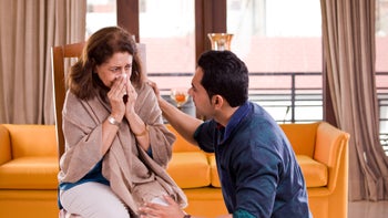 pneumonia: woman sneezing 1150525808