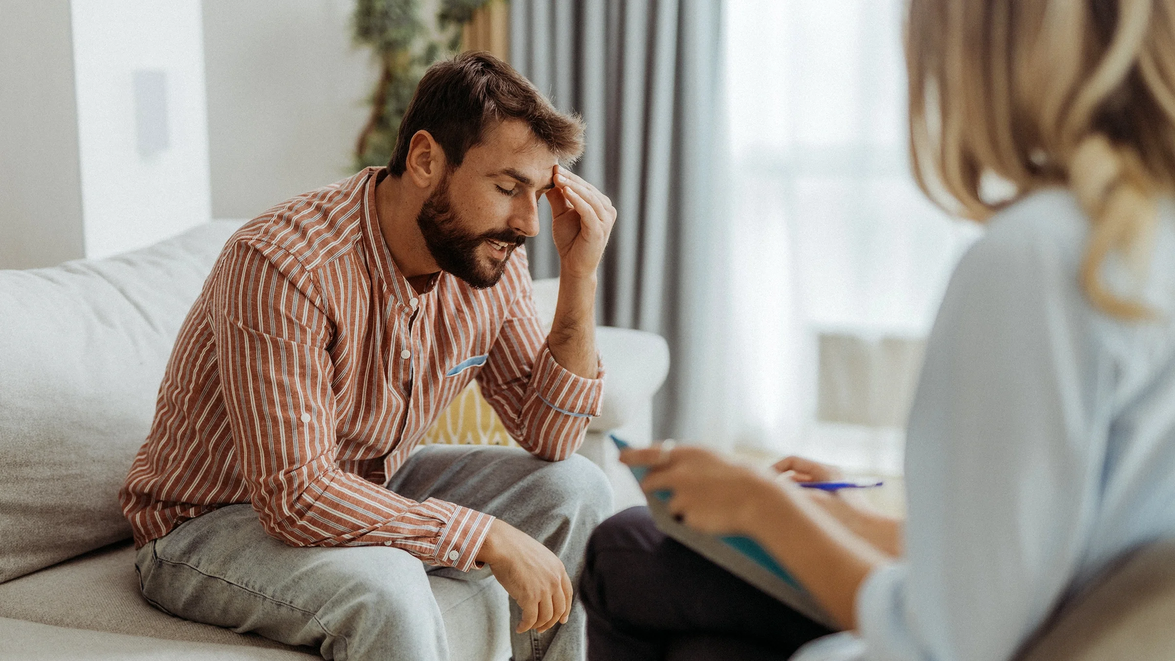 A man is attending a therapy session.