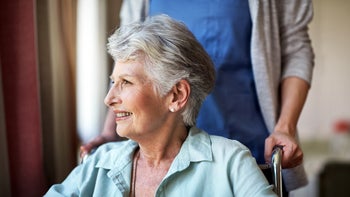 Medicare: portrait of senior woman in wheelchair 649645652