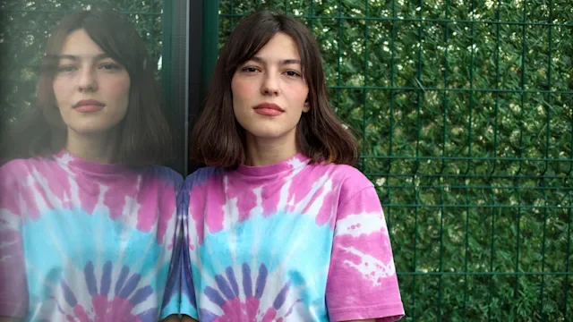 schizophrenia: young woman portrait tie dye shirt-1320987858