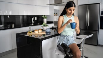 Diet and nutrition: disabled woman drinking coffee 1401137367