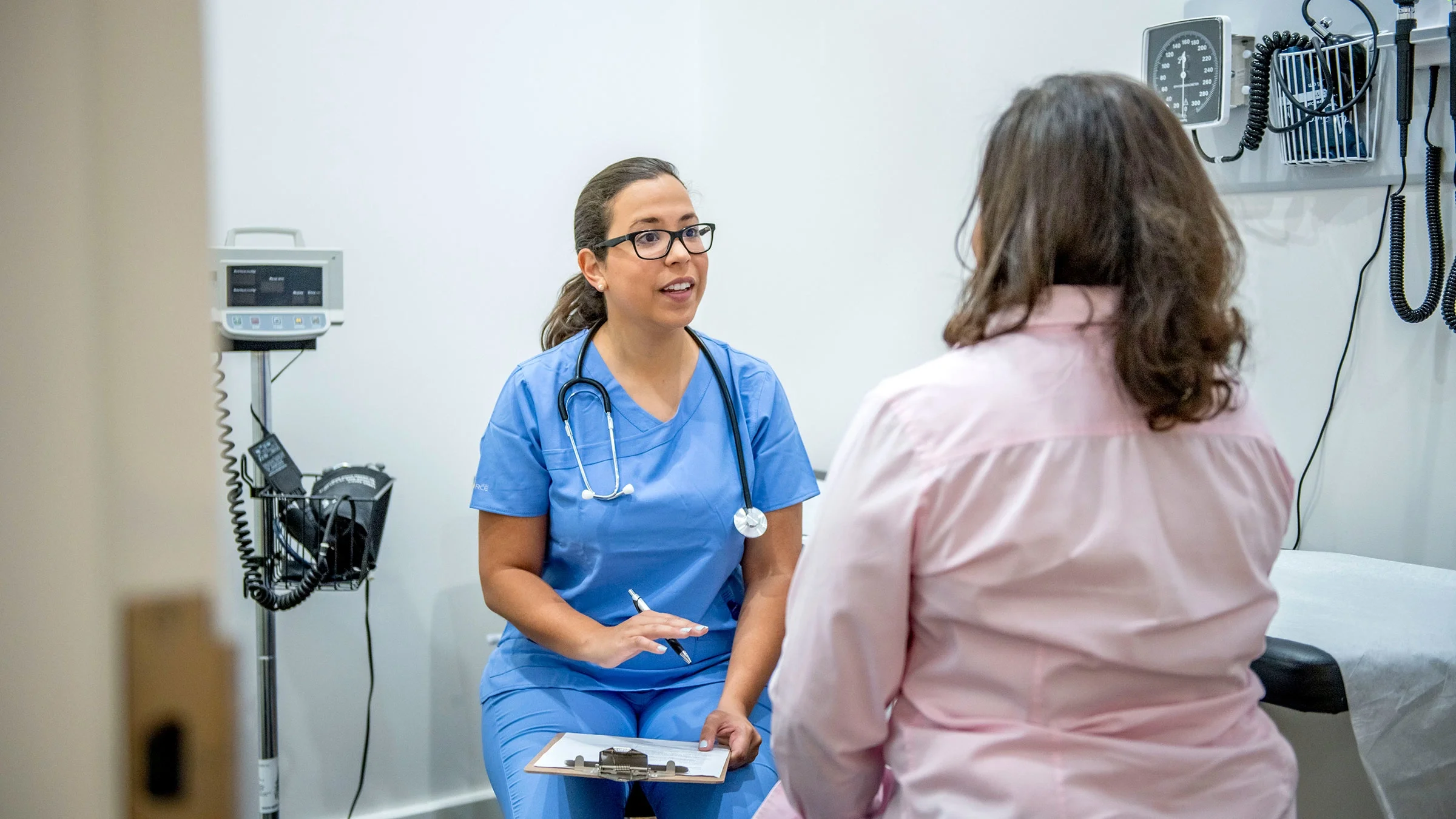 A woman attends a medical appointment.