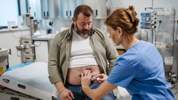 Rheumatoid Arthritis: man receiving injection 1759291980