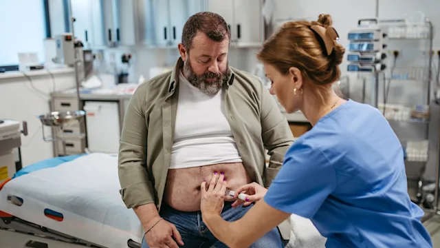 Rheumatoid Arthritis: man receiving injection 1759291980
