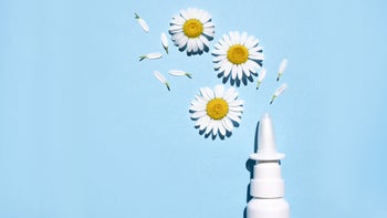 Allergies: nasal spray concept with flowers 1482168865