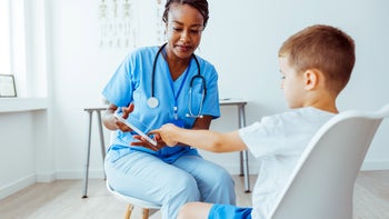 Health: Cystic fibrosis: child at doctors appointment 1415364418