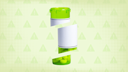Light-green background with texture and warning sign pattern. In the center is a green pill bottle, without a cap, cut into thirds. 
GoodRx Health