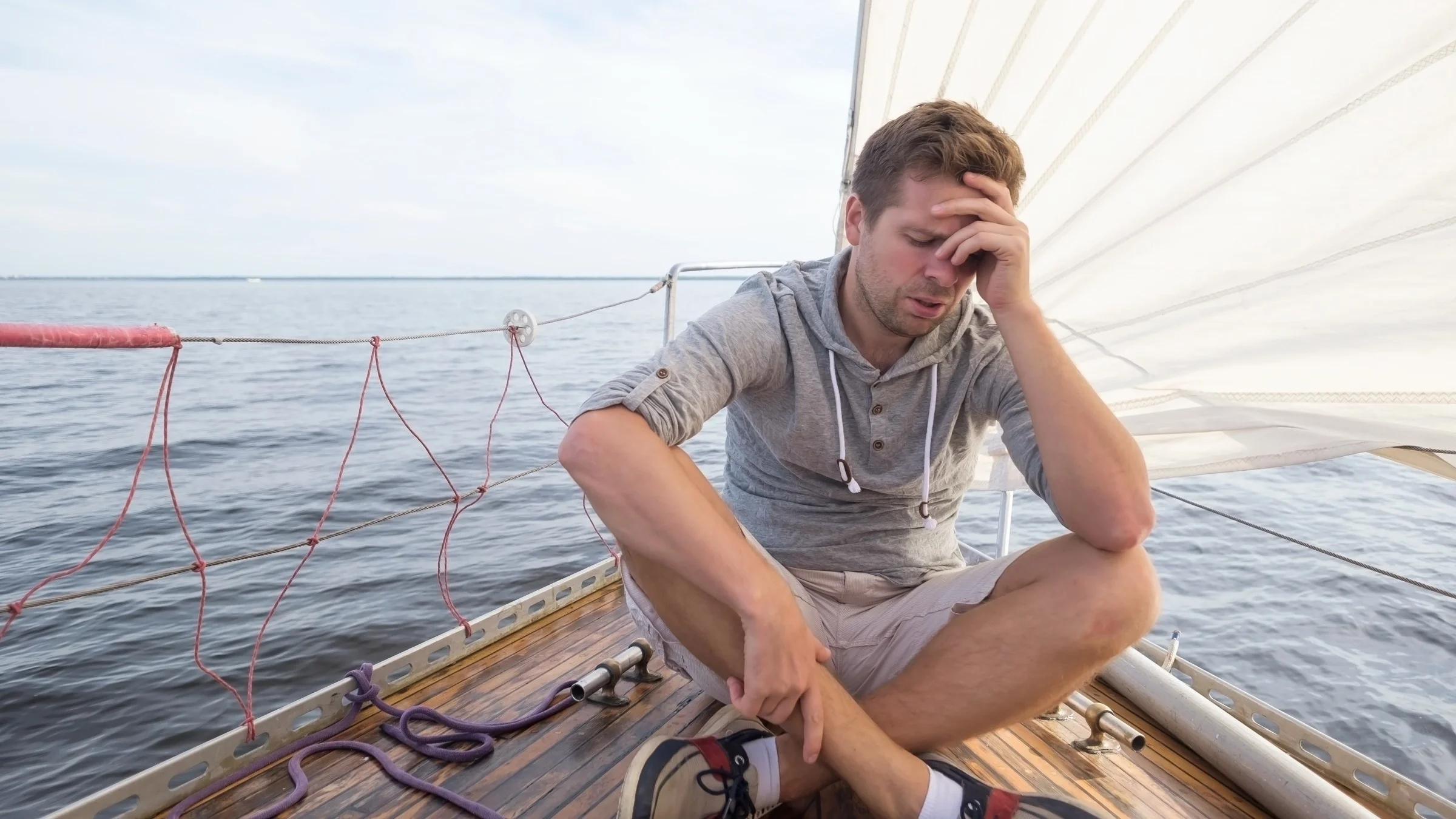 A man experiencing seasickness.