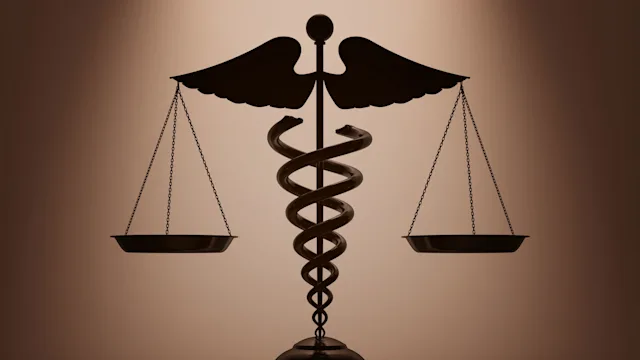 Health: Providers: 3D medical caduceus scales 640025558