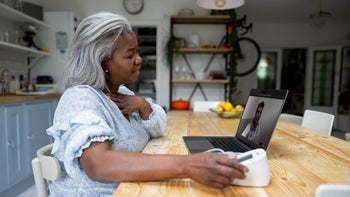 Telehealth: woman speaking to doctor online 1432413408