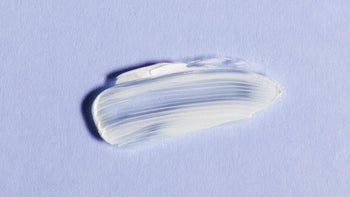 Phexxi: white cream smeared on lavender background 1328326368